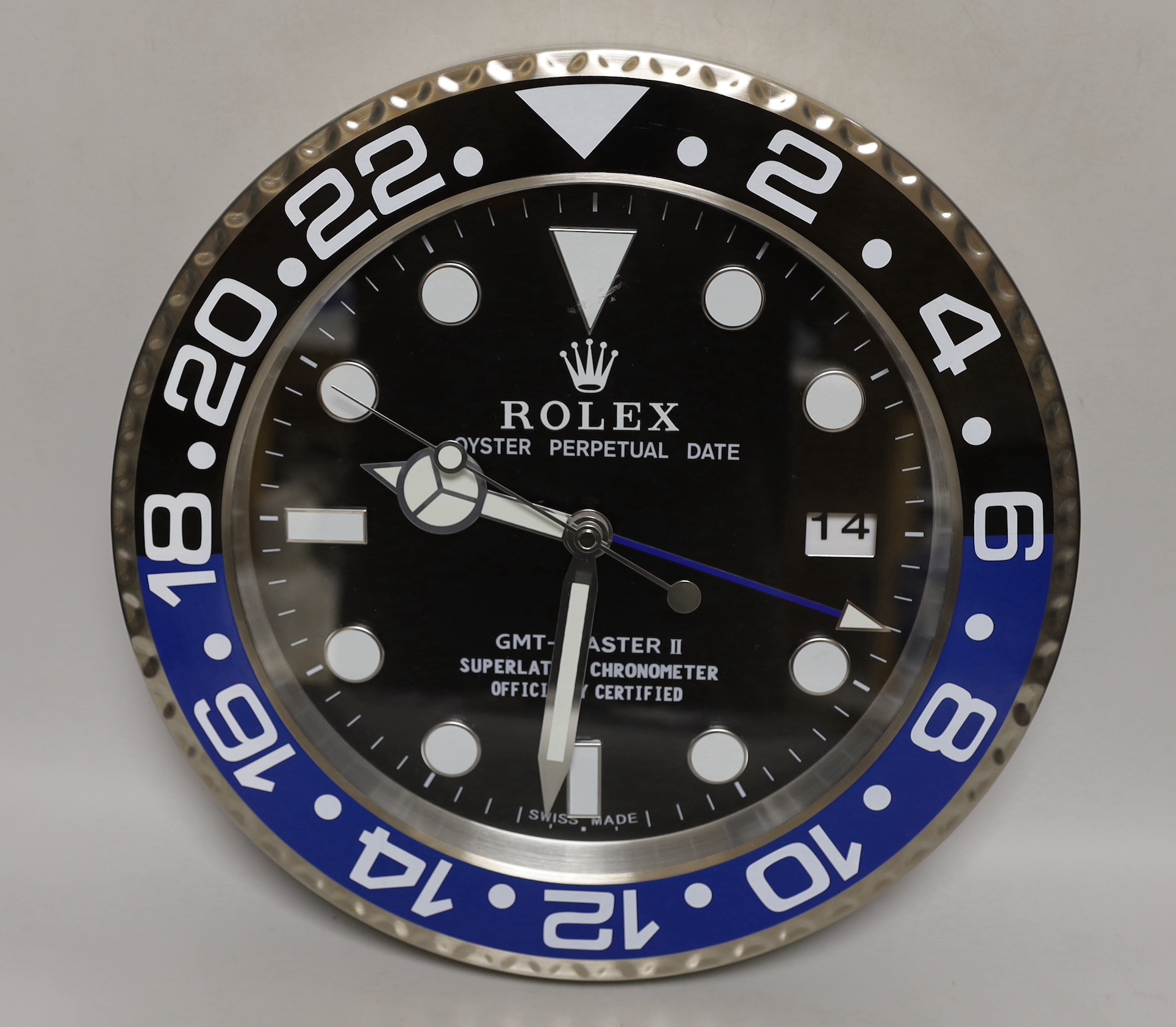 A Rolex style advertising quartz wall clock, 34cm diameter